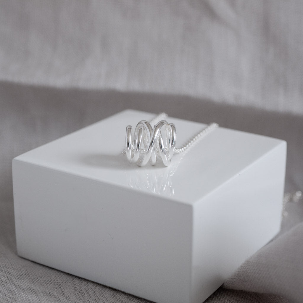 Carolyn Swirl Pendant Necklace