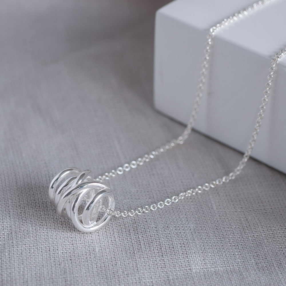 Carolyn Swirl Pendant Necklace