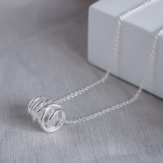 Carolyn Swirl Pendant Necklace