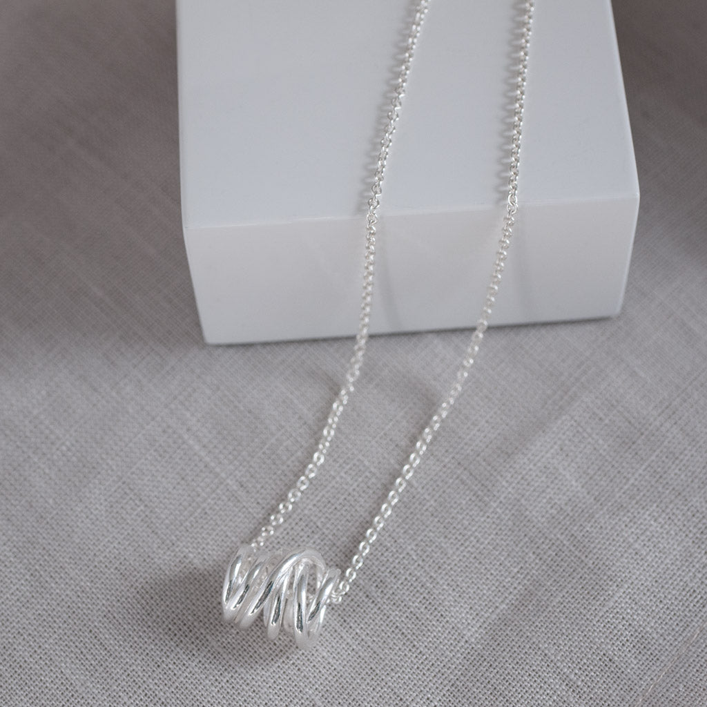 Carolyn Swirl Pendant Necklace