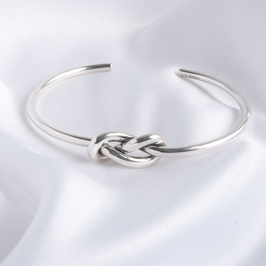 Lille Sterling Silver Double Love Knot Torque Bangle
