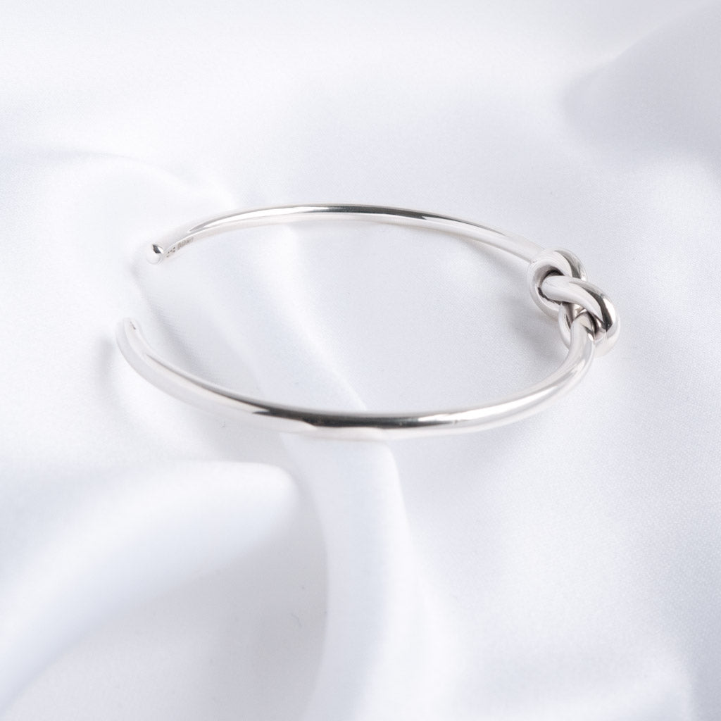 Lille Sterling Silver Double Love Knot Torque Bangle