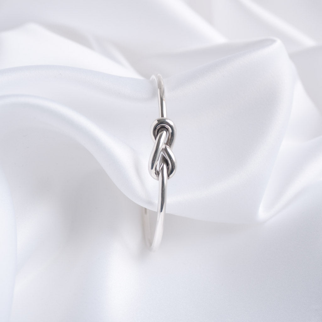 Lille Sterling Silver Double Love Knot Torque Bangle