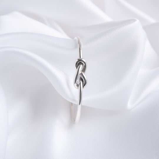 Lille Sterling Silver Double Love Knot Torque Bangle