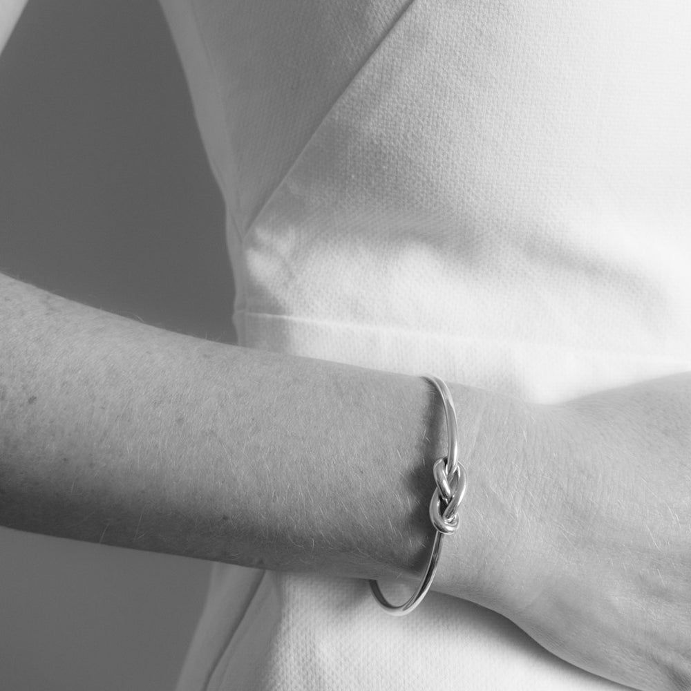 Lille Sterling Silver Double Love Knot Torque Bangle